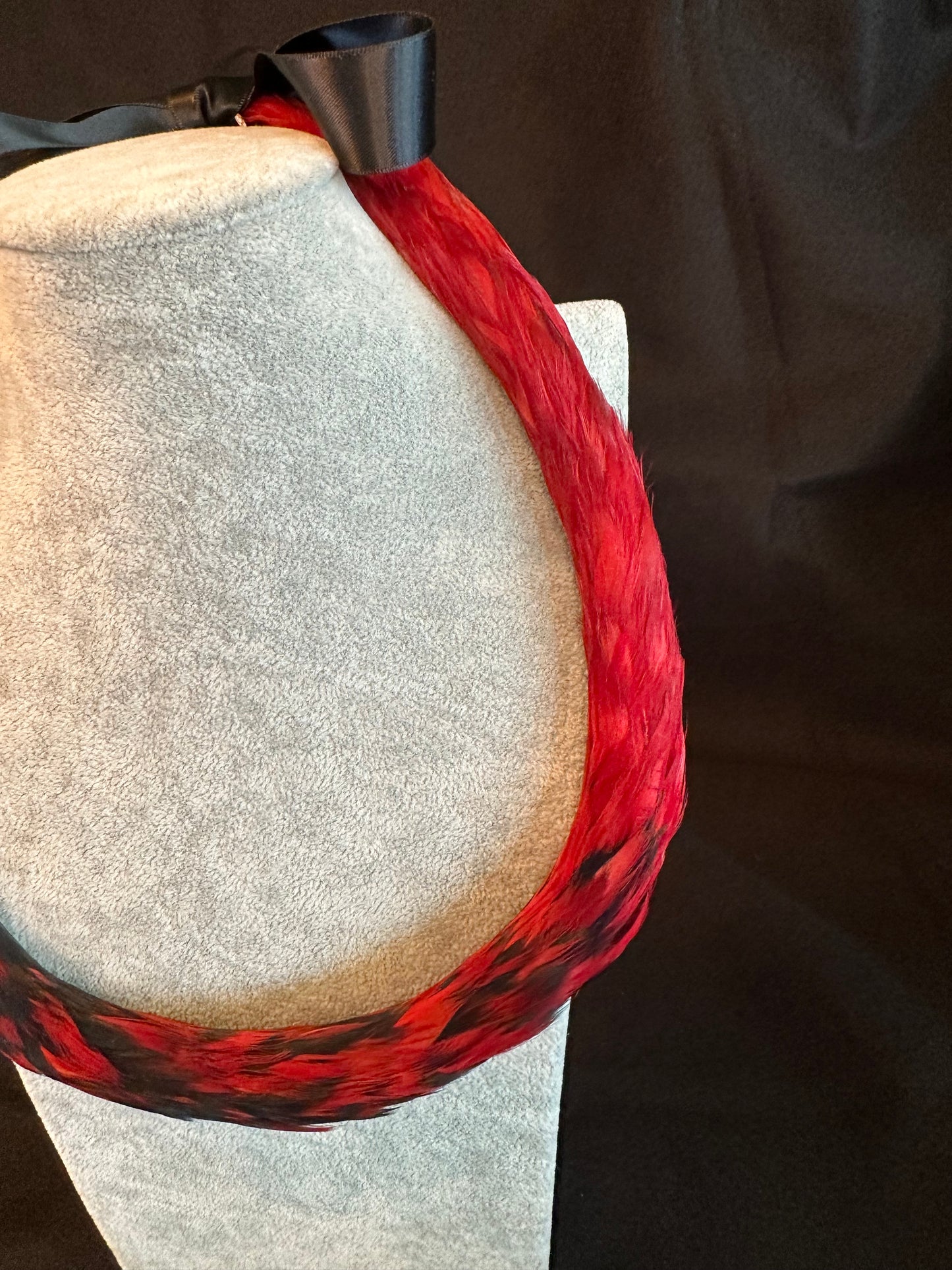 Red and Black Ekolu (2nd cut) Kamoe (lying flat) Lei Hulu (feather lei)
