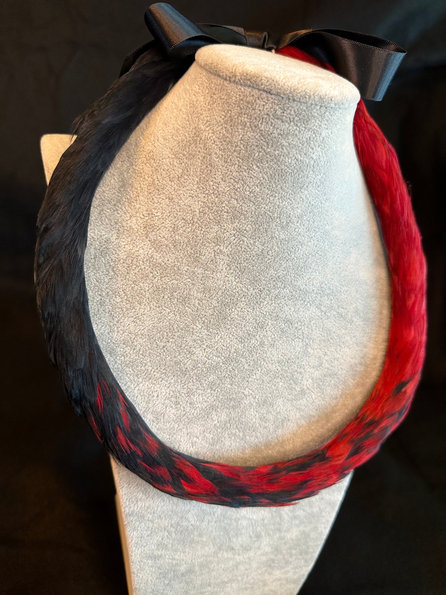 Red and Black Ekolu (2nd cut) Kamoe (lying flat) Lei Hulu (feather lei)