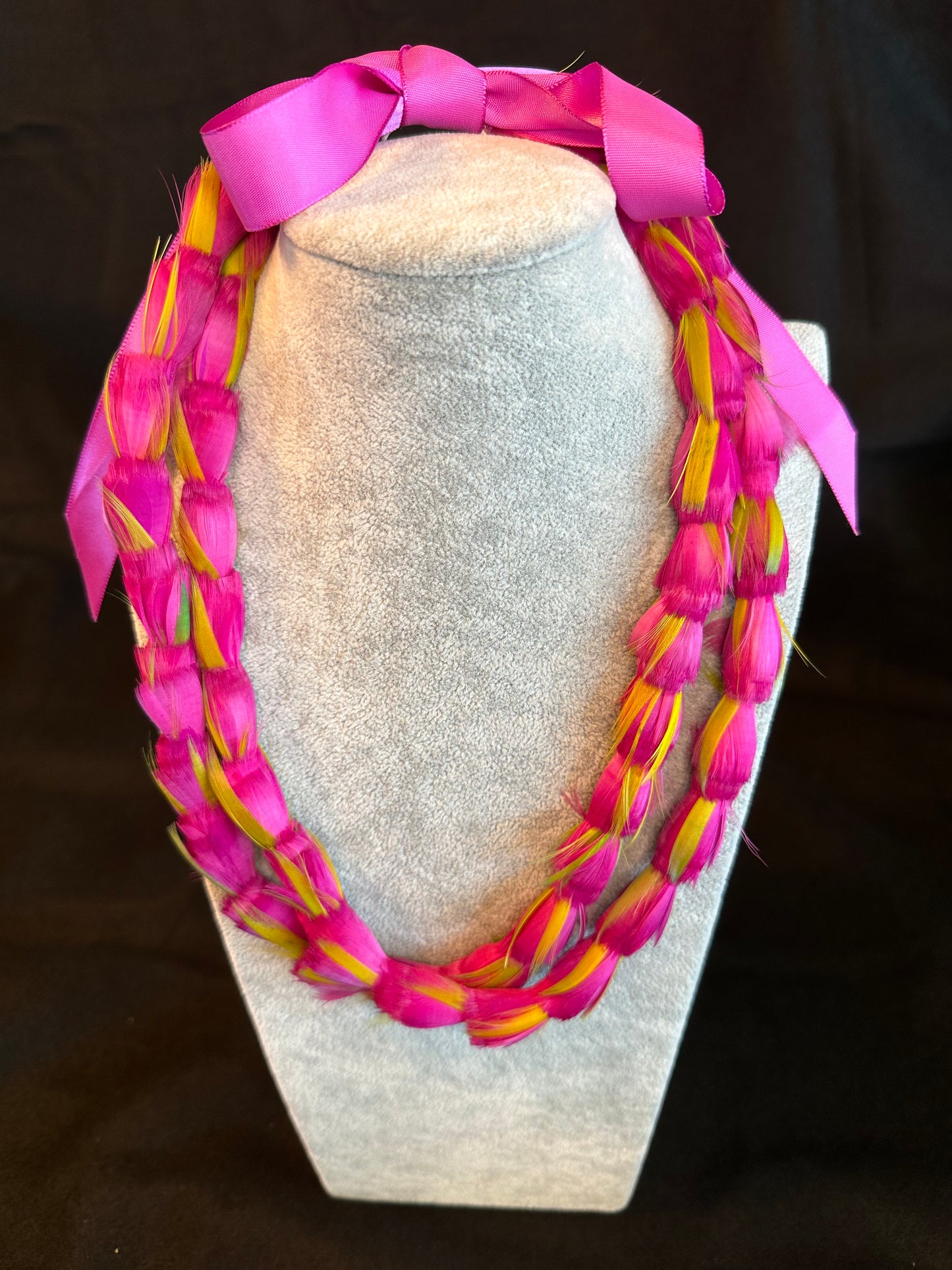 Double strand fuscia Lokelani lei hulu (feather lei)