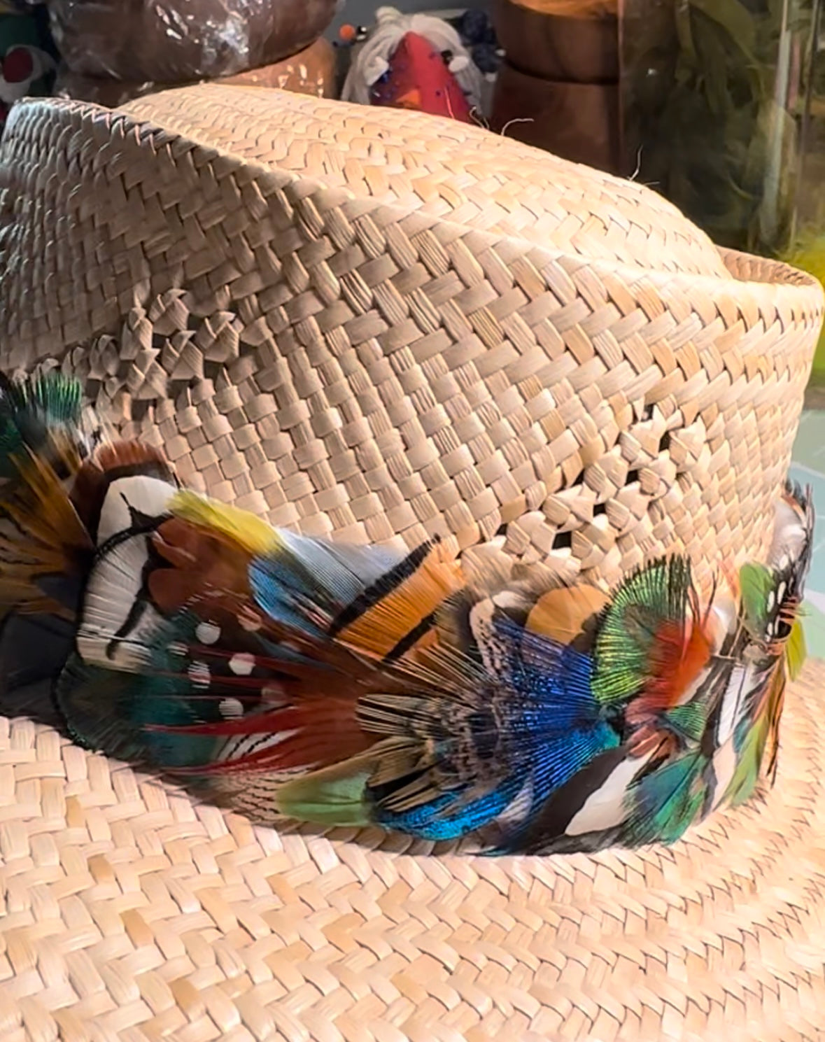Anuenue (rainbow) humu papale (feather hat band)