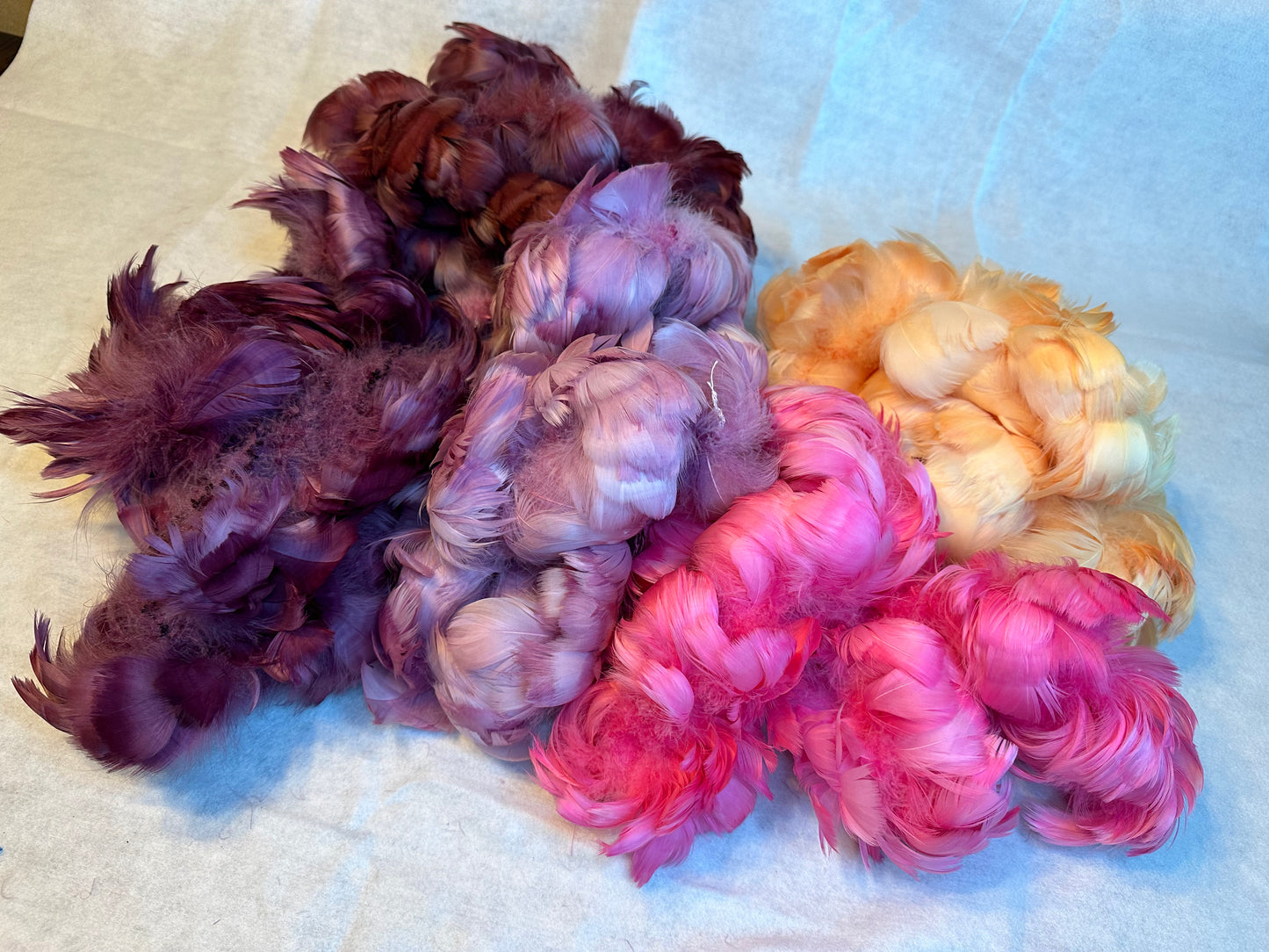 Custom-dyed Plums & Pink goose coquille feathers