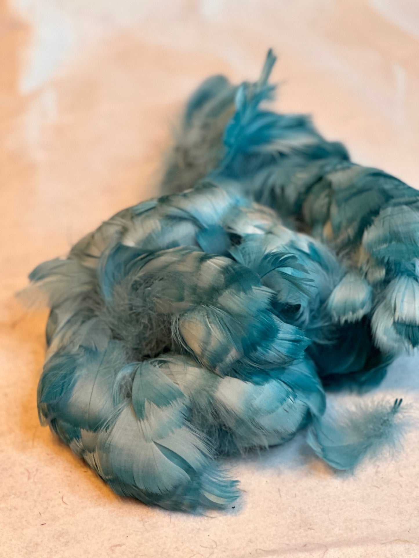 Custom-dyed Blues & Purple Goose Coquille feathers