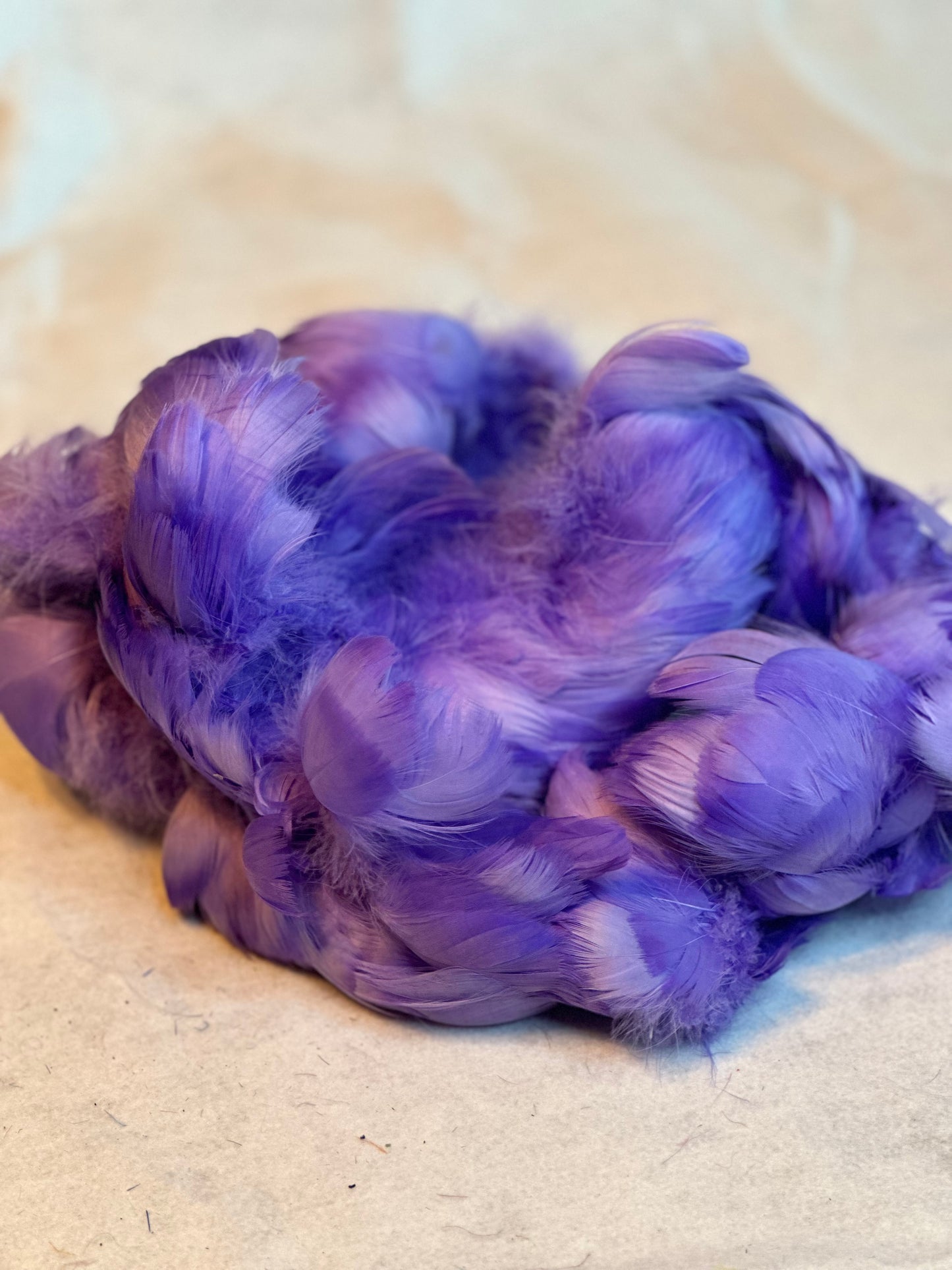 Custom-dyed Blues & Purple Goose Coquille feathers