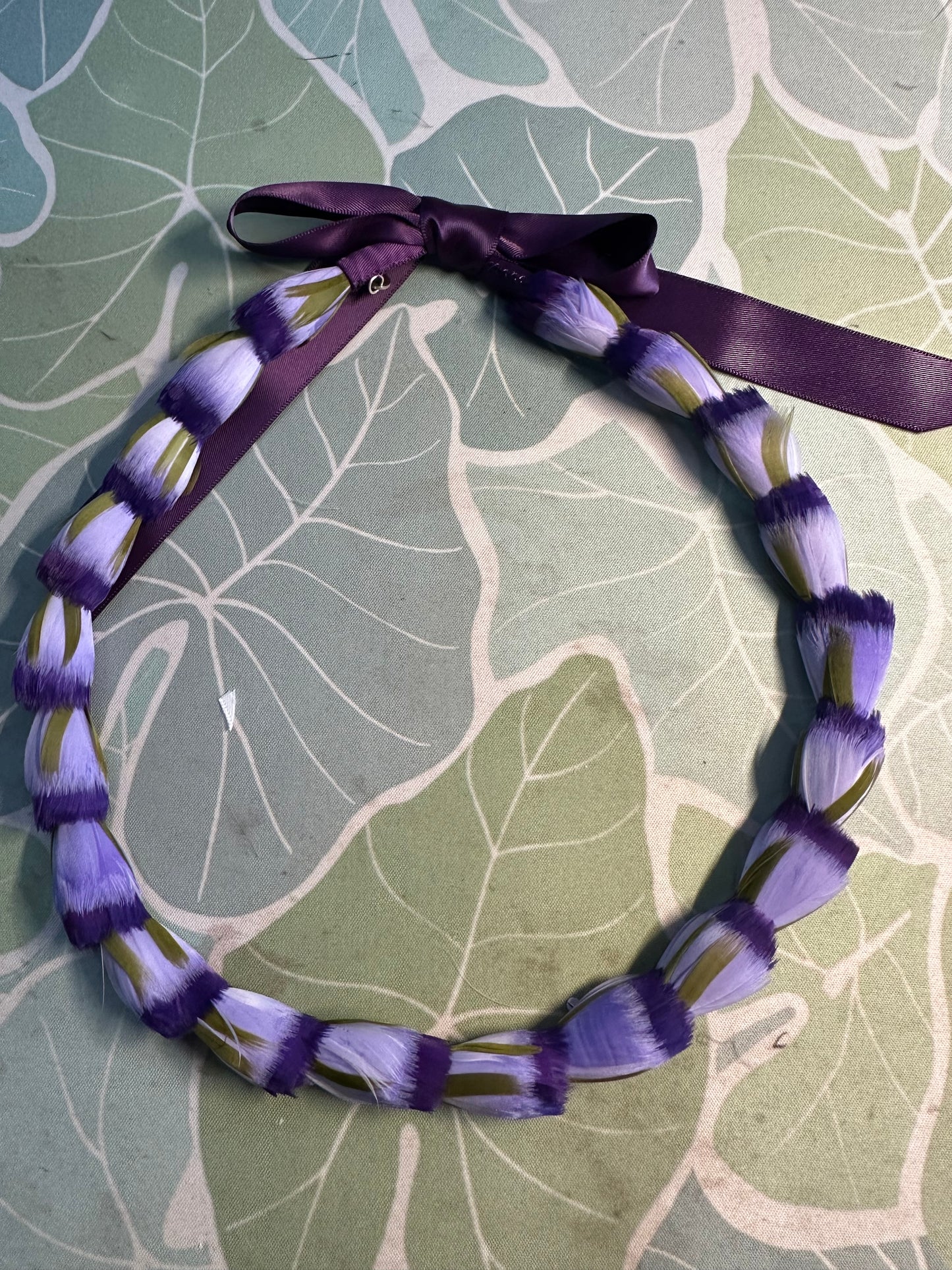 Lei hulu Lokelani (rose lei)