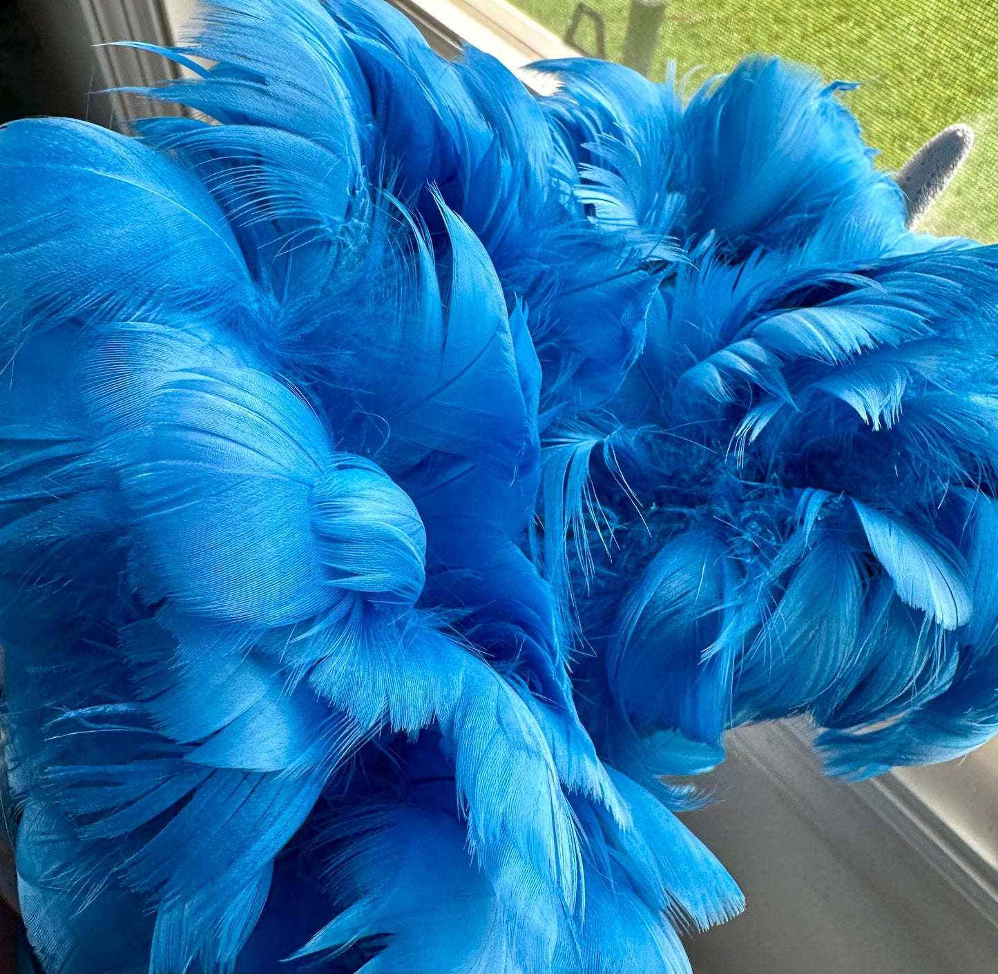 Custom-dyed Blues & Purple Goose Coquille feathers