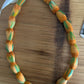 Lei hulu Lokelani (rose lei)