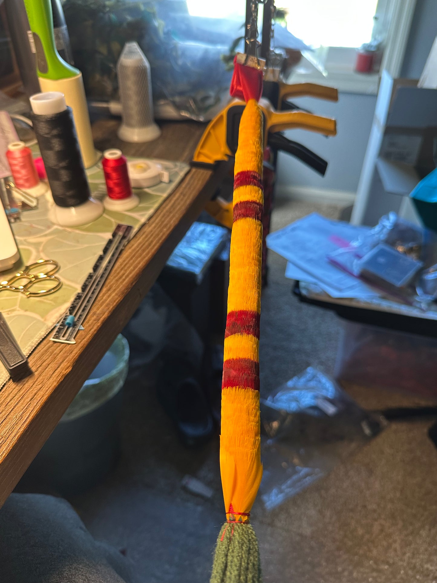 Traditional Kamoe style lei hulu (feather lei)