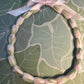 Lei hulu Lokelani (rose lei)