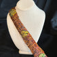 Brown Ringneck pheasant heart feathers with gold peacock accented humu papale (feather hat band)