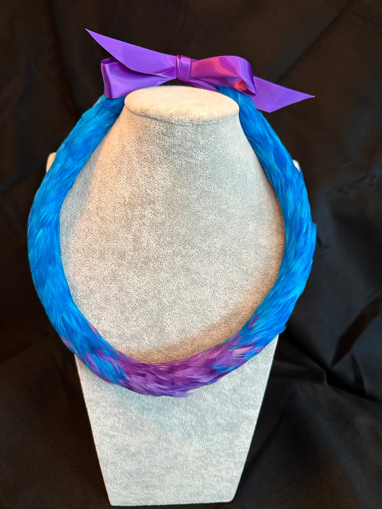 24" Turquoise with purple 2nd cut lei hulu (feather lei)