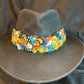 Anuenue (rainbow) humu papale (feather hat band)