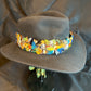 Anuenue (rainbow) humu papale (feather hat band)