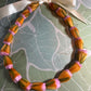 Lei hulu Lokelani (rose lei)