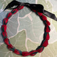 Lei hulu Lokelani (rose lei)