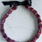 Lei hulu Lokelani (rose lei)
